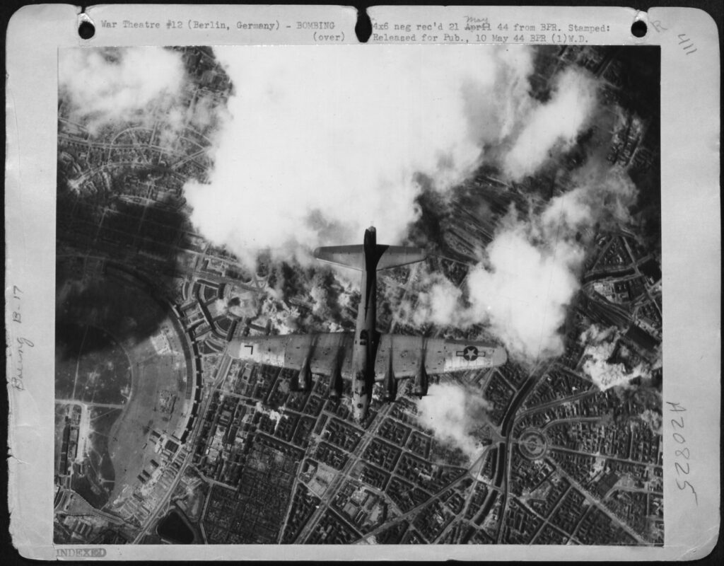 "Masters of the Air" archival photo of plane flying over Europe